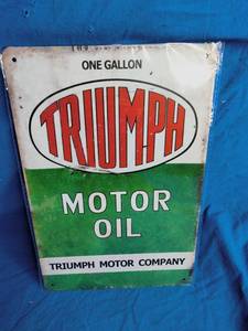 lot 40 image: Triumph Motor Oil Tin Sign