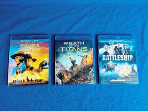 lot 45 image: 3 Blue Ray DVDs - Battleship, Wrath of the Titans, and Cowboys and Aliens