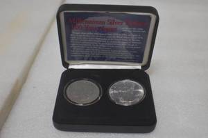 lot 11 image: Millennium Silver dollars