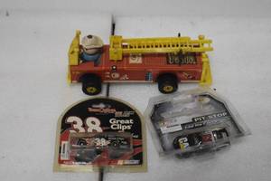 lot 26 image: 2-164 Diecast NasCar and 1 toy Fire Truck with ladder