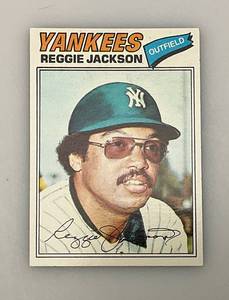 lot 167 image: 1977 Topps # 10 REGGIE JACKSON Baseball Card (In Protective Sleeve)