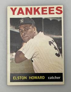 lot 170 image: 1964 Topps # 100 Elston Howard Baseball Card (In Protective Sleeve)