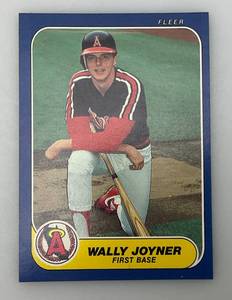 lot 180 image: 1986 Fleer # U-59 Wally Joyner ROOKIE Card (In Protective Sleeve)