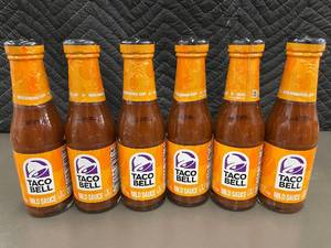 lot 46 image: Set of 6 Taco Bell Mild Sauce Bottles