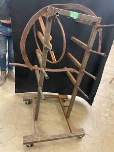 lot 140 image: Rustic Metal Industrial Sculpture Stand with Wheels