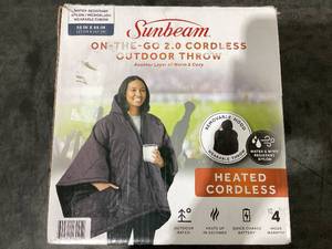 lot 634 image: Sunbeam On-The-Go Outdoor Throw Charcoal Nylon Microplush, 4 Heat Settings, Cordless Heated Blanket, 50 x 60