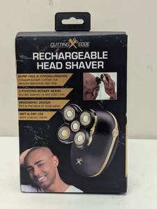 lot 220 image: The Cutting Edge Rechargeable Head Shaver Set with Hypoallergenic Blades - Trial Size - 5ct