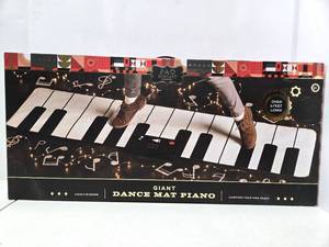 lot 39 image: Like-New or Brand New Large 5 Dance Mat Piano from FAO Schwartz