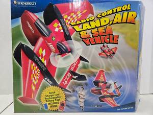 lot 52 image: Like-New or Brand New Megatech RC Land Sea & Air Vehicle