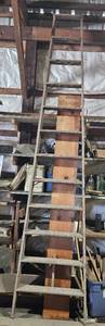 lot 34 image: 12-Foot Wooden Step Ladder with Safety Labels