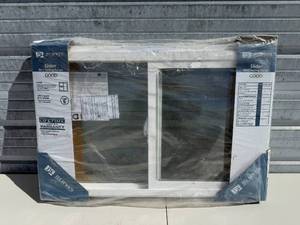 lot 89 image: Jeld-Wen Slider Window with Nailing Flange and Low-E Glass in Orig Pkg