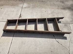 lot 97 image: Used Wooden Ladder with Metal Reinforcements