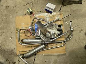 lot 103 image: Collection of Vintage Motorcycle Parts and Exhausts