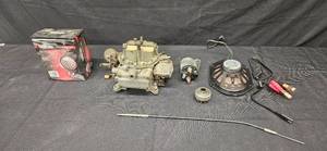lot 155 image: Assortment of Automotive Parts Including Carburetor and Utility Light in Orig Pkg