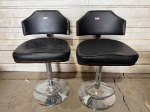 lot 178 image: Pair of Black Vinyl Adjustable Bar Stools with Visible Wear
