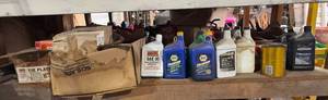 lot 194 image: Assorted Motor Oil, Fasteners, and Hardware Collection - content quantities unverified