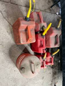 lot 198 image: Collection of Used Red Gasoline Cans with Spouts
