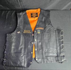 lot 206 image: Milwaukee Leather Motorcycle Vest with Sturgis Patches, Size 48