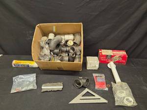 lot 215 image: Assorted Plumbing Supplies and Tools Collection with Pipe Fittings and French Fry Cutter