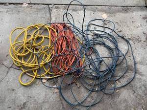 lot 247 image: Assorted Heavy-Duty Extension Cords in Yellow, Orange, and Blue (Untested)