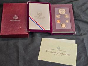 lot 1A image: 1988 United States Olympic Coins Prestige Set Silver Dollars with Certificate of Authenticity