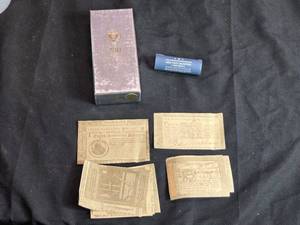 lot 16 image: Roll of Arkansas Hot Springs Quarters in 230 Gram Packaging, Also Facsimile Copies of Historical Currency