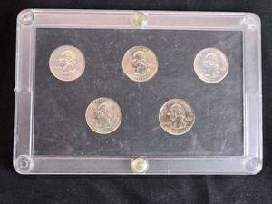 lot 19 image: U.S. State Quarters 1999 Collection in Display Case - Connecticut, Georgia, New Jersey, Pennsylvania, Delaware