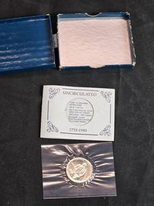 lot 59 image: Uncirculated George Washington Silver Commemorative Half-Dollar Coin