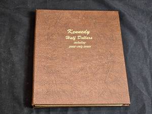 lot 71 image: Empty Kennedy Half Dollar Coin Album for Proof and Regular Issues