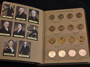 lot 74 image: Presidential One Dollar Coins in Album - 28 Coins Including 2007 P, D & 2010 P, D