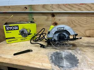 lot 51 image: RYOBI 13 Amp Corded 7-14 in. Circular Saw