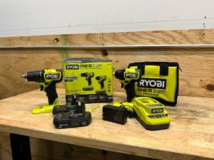lot 59 image: RYOBI ONE HP 18V Brushless Cordless Compact 12 in. Drill and Impact Driver Kit with (2) 1.5 Ah Batteries, Charger, and Bag