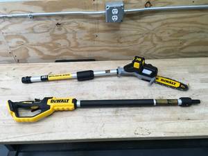 lot 22 image: DEWALT 20V MAX 8in. Brushless Cordless Battery Powered Pole Saw Model # DCPS620B - Tool Only