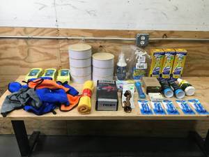 lot 129 image: Lot of Cleaning Supplies, Storage Tins and More