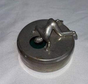CUFF LINK CASK, "Original", pewter, Widerholm & Dahlberg, 1930'sMetal Ashtray with Figure