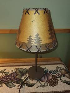 lot 22 image: Rustic Deer Table Lamp with Leather Shade