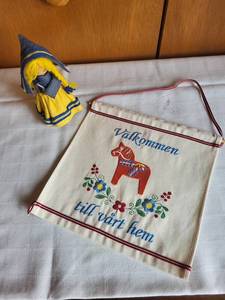 lot 98 image: Scandinavian Wall Hanging & Doll Set