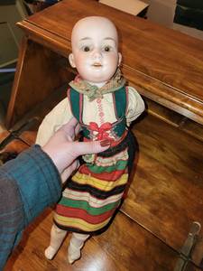 lot 203 image: Vintage Bisque Doll in Traditional Dress