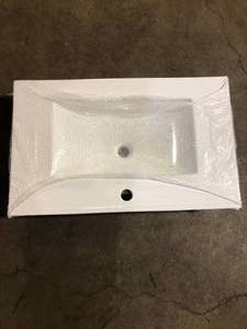 lot 38 image: Vanity Top Sink    Customer Returns See Pictures