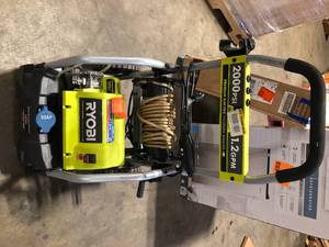 lot 23 image: Ryobi 2000 PSI Pressure Washer Missing Pieces    Customer Returns See Pictures