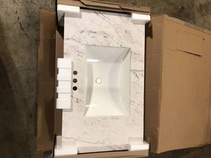 lot 35 image: Home Decorators Collection 37 in. W x 22 in. D Engineered Stone Composite White Rectangular Single Sink Vanity Top in Lunar  Customer Returns See Pictures