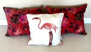 lot 137 image: Three Vibrant Accent Pillows