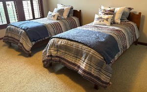 lot 215 image: Two Vintage Twin Beds with Reversible Bedding