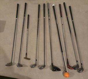 lot 265 image: Ladies and Mens Golf Clubs by Wilson, Taylor Made, Callaway and More including an Orange Whip
