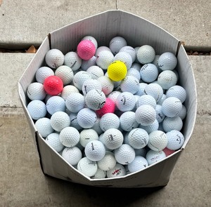 lot 279 image: Box Bursting with Golf Balls