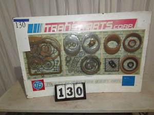 lot 130 image: Wall Display of Transmission Parts