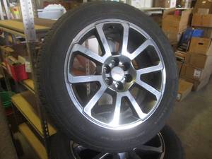 lot 16 image: (FRNT) Set of 4 Rims with Tires Off...