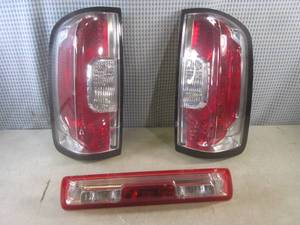lot 14 image: (EW4) Tail Lghts Off a 2017 GMC Can...