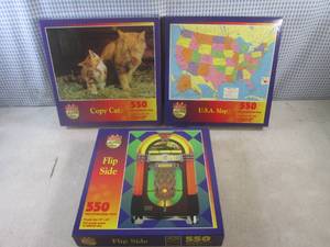 lot 86 image: (CS) 3 New 550 Piece Puzzles - Unop...