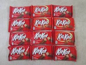 lot 219 image: (B-1) 12 Kit Kat Candy Bars Past Da...